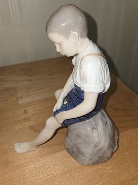 Porcelain Boy Figurine in Blue Outfit - Collectible Decorative Accent